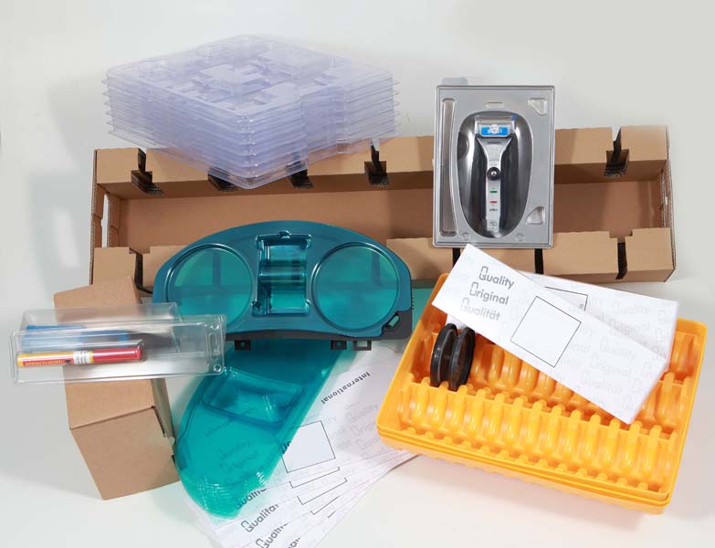 Cardboard boxes and thermoforming parts